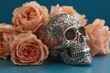 © BabyEyes - A decorative skull, adorned with intricate designs, rests amongst delicate, peach-colored roses, creating a captivating still life against a teal backdrop.