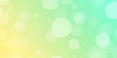 Abstract bokeh background with yellow and green gradient