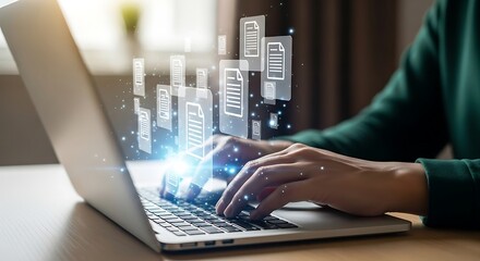 Person typing on a laptop with digital documents floating above the keyboard, representing data management and online information
