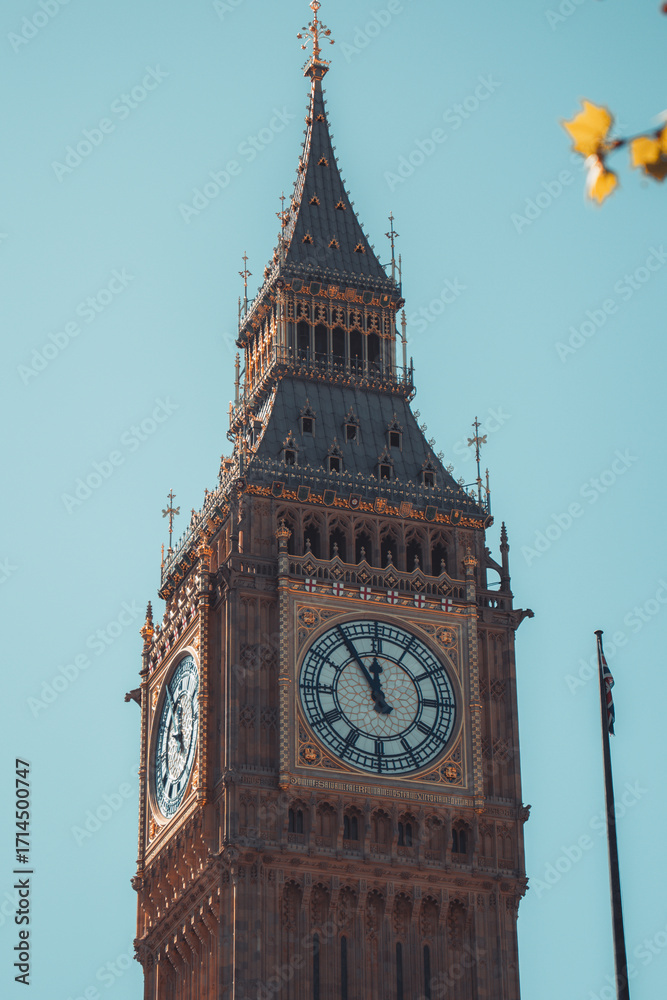 Majestic big ben clock tower against blue sky and white clouds, a ...