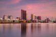 Toledo, Ohio, USA. Cityscape image of downtown Toledo, Ohio with reflection of the skyline in calm Maumee River  at beautiful autumn sunrise.
