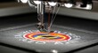 © Backbencher_2B - Close up of a detailed embroidered patch in process on industrial sewing machine