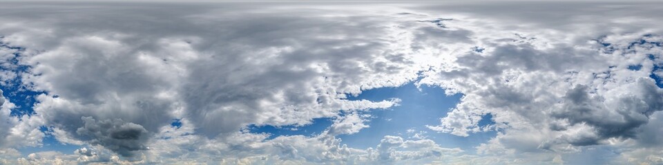 Wall Mural - seamless cloudy blue sky with sun 360 hdri panorama with zenith and beautiful clouds for use in 3d graphics or game development as sky dome or edit drone shot