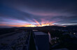 Breathtaking Sunset Over Urban Landscape with Vibrant Sky Colors