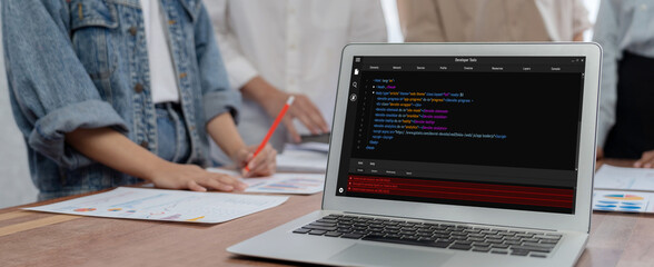 Software development programming on computer screen for brisk application and program coding