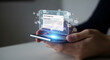 © Hammad - Person holding a futuristic transparent smartphone displaying an email notification with glowing digital elements.