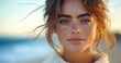 © app - Close-up portrait of a young woman with freckles and blue eyes looking calmly into the camera with soft natural light and a blurred outdoor background