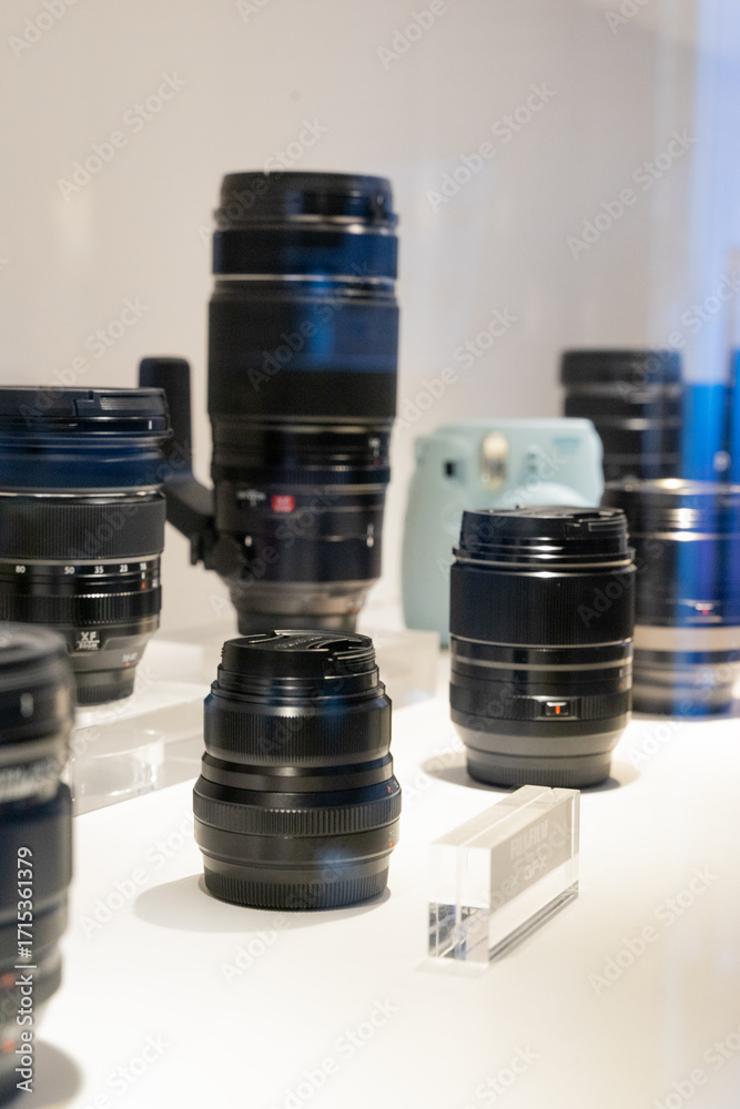 A group of camera lenses from various brands including Canon and Sony ...