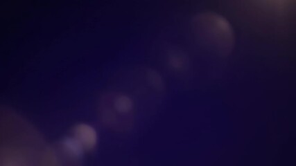 Wall Mural - watch a seamlessly looping video with a delicate, soft lens flare subtly moving across the frame, ev