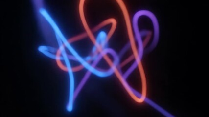 Wall Mural - wavy lines of vibrant neon light flow and intertwine in a captivating, seamlessly looping video even
