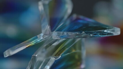 Wall Mural - Refracting glass shards arrange in vibrant abstract symmetrical balance, creating a dynamic seamlessly looping prismatic background abstract, innovative, art