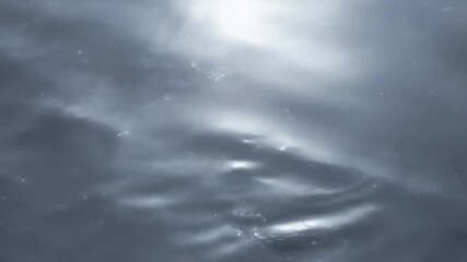 Wall Mural - a fluid starlight glow resembling molten silver or quicksilver, slowly morphing and flowing across t