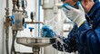© VividStock - Worker using eyewash station, safety equipment, industrial facility
