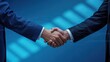 © Prosenjit - Handshake of Trust: A powerful visual of a handshake, symbolizing agreement and partnership against a modern, digitally-inspired backdrop.