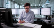 © Andrey Popov - Senior Accountant Using Technical Software To Analyze Medical Invoices