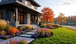 © Pete - Modern home with autumnal landscape design features vibrant fall colors, rich garden, serene lake view. Stone, dark siding exterior complements ornamental plants, creating tranquil, elegant property.