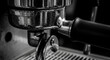 © Kartono - Close-up of espresso machine portafilter and group head.