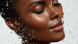 © PhotoLuxeStudio - Beautiful woman with glowing skin enjoys refreshing water splash, expressing calm and relaxation in close up portrait