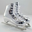 © Dina - A pair of mirrored silver ice skates with white laces, displayed against a neutral background, showcasing a highly polished, reflective surface