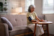 © snowing12 - Asian older woman independently monitors blood pressure at home for proactive health management and personal wellness