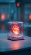 © Margarita Ratatosk - Glowing human heart model in glass container. Future of biotechnology and artificial organs for medical research and surgical planning.