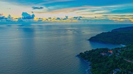 Wall Mural - aerial hyperlapse view colorful cloud in stunning sunset at the sea in sunset. Scene of clouds floating in colorful sky in beautiful sunset. Gradient color. Sky texture, abstract nature background.