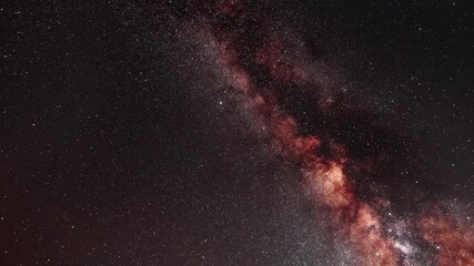 Wall Mural - Starry sky timelapse background. Beautiful night sky with Milky Way galaxy on dark sky.