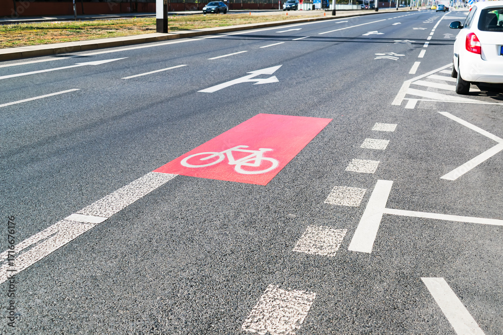 Bike lane markings on asphalt road Stock Photo | Adobe Stock