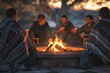 © Ruslan - Friends gathered around outdoor fire pit wrapped in blankets