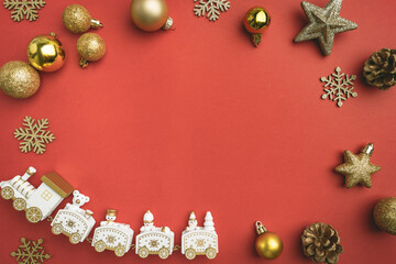 Wall Mural - christmas and happy new year background with gold glitter decorations on red bright background. holi