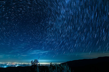 Wall Mural - Star Trails of Polaris North Star at 15mm Above Bakersfield Astrophotography Night Sky in California USA
