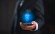 © JD8 - Businessman holding smartphone with virtual AI assistant chatbot hologram, smart technology for digital communication, innovation and artificial intelligence solutions in modern business. AI
