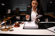 © aekachai - Female Lawyer Reviewing Legal Documents in Law Firm Office