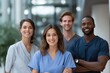 © Iryna - Diverse group of young medical professionals smiling in hospital