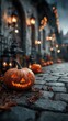 © Andrii - Pumpkin lanterns light the cobblestone street