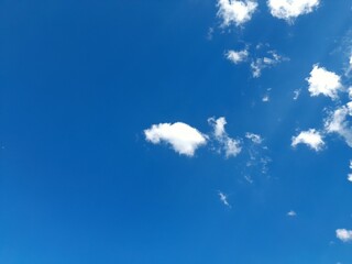 Wall Mural - small white clouds blue sky photo.