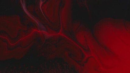 Wall Mural - Vibrant paint. Color blend. Defocused red water splash sparkling ripple texture floating on abstract dark black acrylic art background.