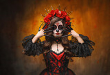 Close-up gothic fantasy woman with halloween make-up sugar skull sceleton body art beauty scary face red lips roses in wavy dark hair. sexy girl finger rings black claws longring posing with hands