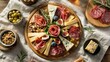 © NATALIIA - Charcuterie board with artisan meats, aged cheeses, fresh figs and rosemary on circular wooden platter with elegant overhead presentation