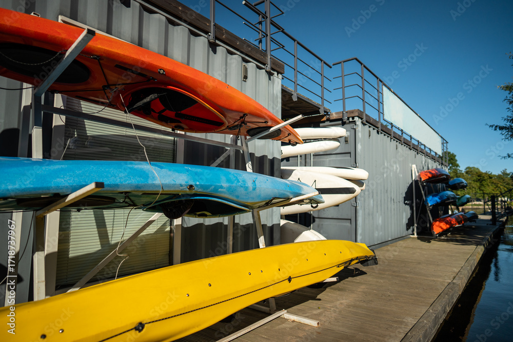 urban waterway tourism, paddleboard launch site, active lifestyle in city, public access to water sports, eco friendly river recreation, floating workout for tourists, paddle launch in travel