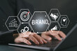 © Goodtime - Business and branding concept. Creating, developing and maintaining a brand's identity and market reputation. positioning, strategic planning, and communication to establish a strong brand image.