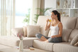 © Antonioguillem - Yogi resting drinking tea after yoga exercises at home