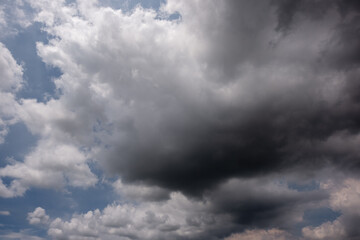 Wall Mural - dark sky with stormy clouds. dramatic sky rain,dark clouds before a thunder-storm,clouds before rain