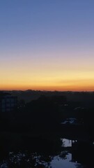 Wall Mural - Stunning sunset view over Sylhet, Bangladesh with tranquil dusk sky