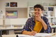 © Rido - Happy teenager student thinking at secondary classroom