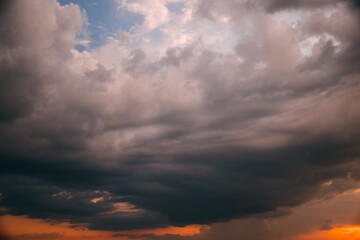 Wall Mural - early morning Sky Background Dramatic Sky. sunrise Sunset Yellow Orange Pink Colors. vibrant colors sunrise Sky With Fluffy Clouds
