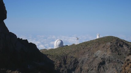 Wall Mural - Astronomical observatories on a mountain top above the clouds on La Palma, Canary Islands