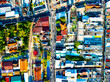 Aerial view of residential houses and driveways neighborhood during a fall sunset or sunrise time.Tightly packed homes.Top view over building houses in phuket thailand