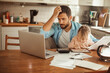 © Geber86 - Stressed father working from home with daughter