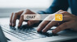 © Nur - Navigating Digital Communication A Person Typing on a Laptop Searching for Chat Solutions and Engaging in Online Conversations for Business and Personal Use